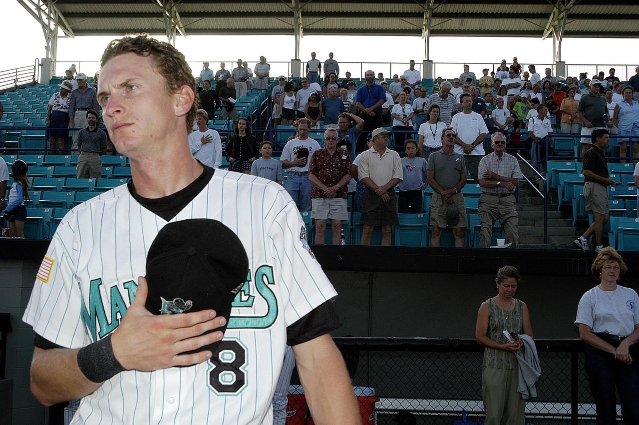 KENNEDY SPACE CENTER, FLA. - The Brevard Manatees, a minor league baseball team in Central Florida, hosts KSC employees at a ballgame at Manatees Stadium.   Before the game, attendees offered a moment of silence to honor the STS-107 crew and two recovery workers who died in a helicopter crash.