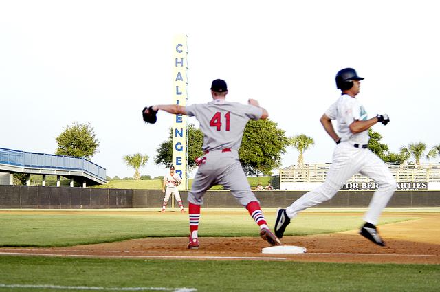 NASA image: KENNEDY SPACE CENTER, FLA. -  There is action on the baseball diamond during a game at Manatees Stadium, home of the Brevard Manatees, a minor league baseball team in Central Florida.  The team hosted KSC employees for the game, which included a moment of silence to honor the STS-107 crew and two recovery workers who died in a helicopter crash.