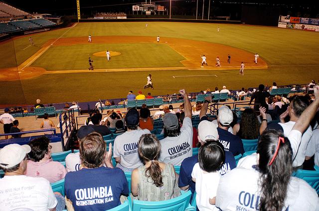NASA image: KENNEDY SPACE CENTER, FLA. - KSC employees enjoy a baseball game at Manatees Stadium, home of the Brevard Manatees, a minor league baseball team in Central Florida.  The team hosted the employees for the game, which included a moment of silence to honor the STS-107 crew and two recovery workers who died in a helicopter crash.