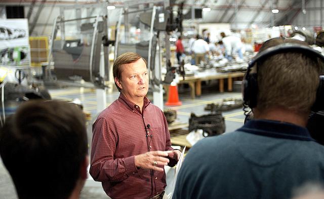 NASA image: KENNEDY SPACE CENTER, FLA. - Shuttle Launch Director Mike Leinbach talks to the media in the RLV Hangar, site of the collection of Columbia debris undergoing examination.  The items shipped to KSC number more than 82,000 and weigh 84,800 pounds or 38 percent of the total dry weight of Columbia.  Of those items, 78,760 have been identified, with 753 placed on the left wing grid in the Hangar.