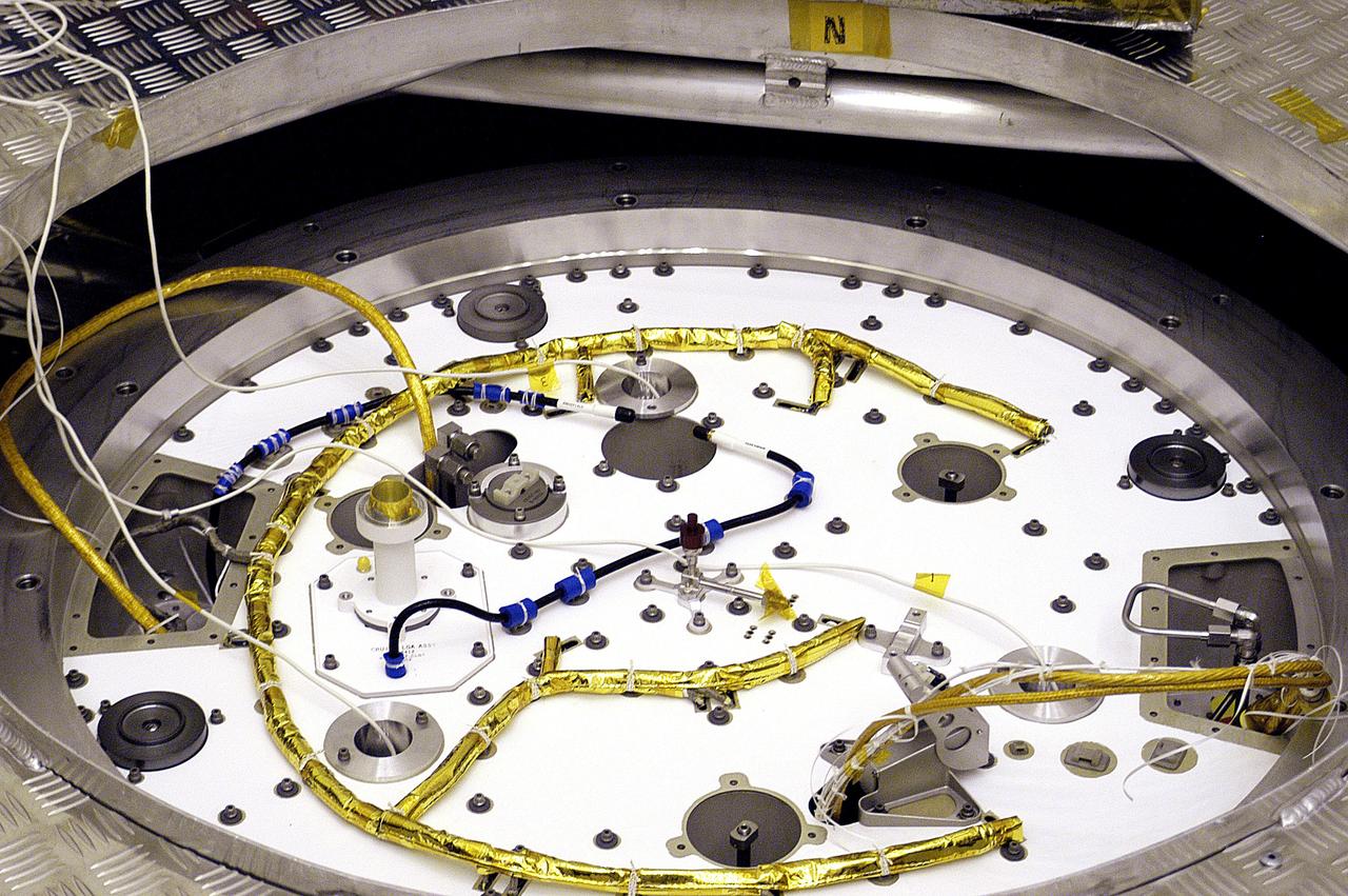 KENNEDY SPACE CENTER, FLA. - A closeup of the cruise stage to be mated to the Mars Exploration Rover 2 (MER-2) entry vehicle.    The cruise stage includes fuel tanks, thruster clusters and avionics for steering and propulsion.  NASA's twin Mars Exploration Rovers are designed to study the history of water on Mars. These robotic geologists are equipped with a robotic arm, a drilling tool, three spectrometers, and four pairs of cameras that allow them to have a human-like, 3D view of the terrain. Each rover could travel as far as 100 meters in one day to act as Mars scientists' eyes and hands, exploring an environment where humans can't yet go.  MER-2 is scheduled to launch June 5 as MER-A aboard a Delta rocket from Cape Canaveral Air Force Station.