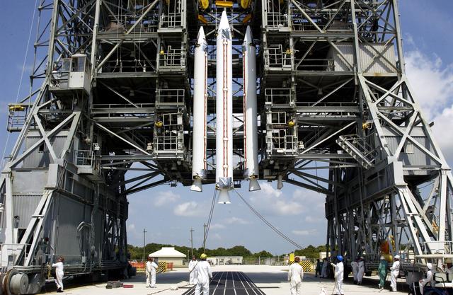 NASA image: KENNEDY SPACE CENTER, FLA. -  Three solid rocket boosters (SRBs) are suspended in the launch tower on Launch Complex 17-A, Cape Canaveral Air Force Station,  prior to mating with the Delta II rocket for launch of Mars Exploration Rover 2 (MER-2). NASA’s twin Mars Exploration Rovers are designed to study the history of water on Mars. These robotic geologists are equipped with a robotic arm, a drilling tool, three spectrometers, and four pairs of cameras that allow them to have a human-like, 3D view of the terrain. Each rover could travel as far as 100 meters in one day to act as Mars scientists' eyes and hands, exploring an environment where humans can’t yet go.  MER-2 is scheduled to launch June 5 as MER-A.  MER-1 (MER-B) will launch June 25.
