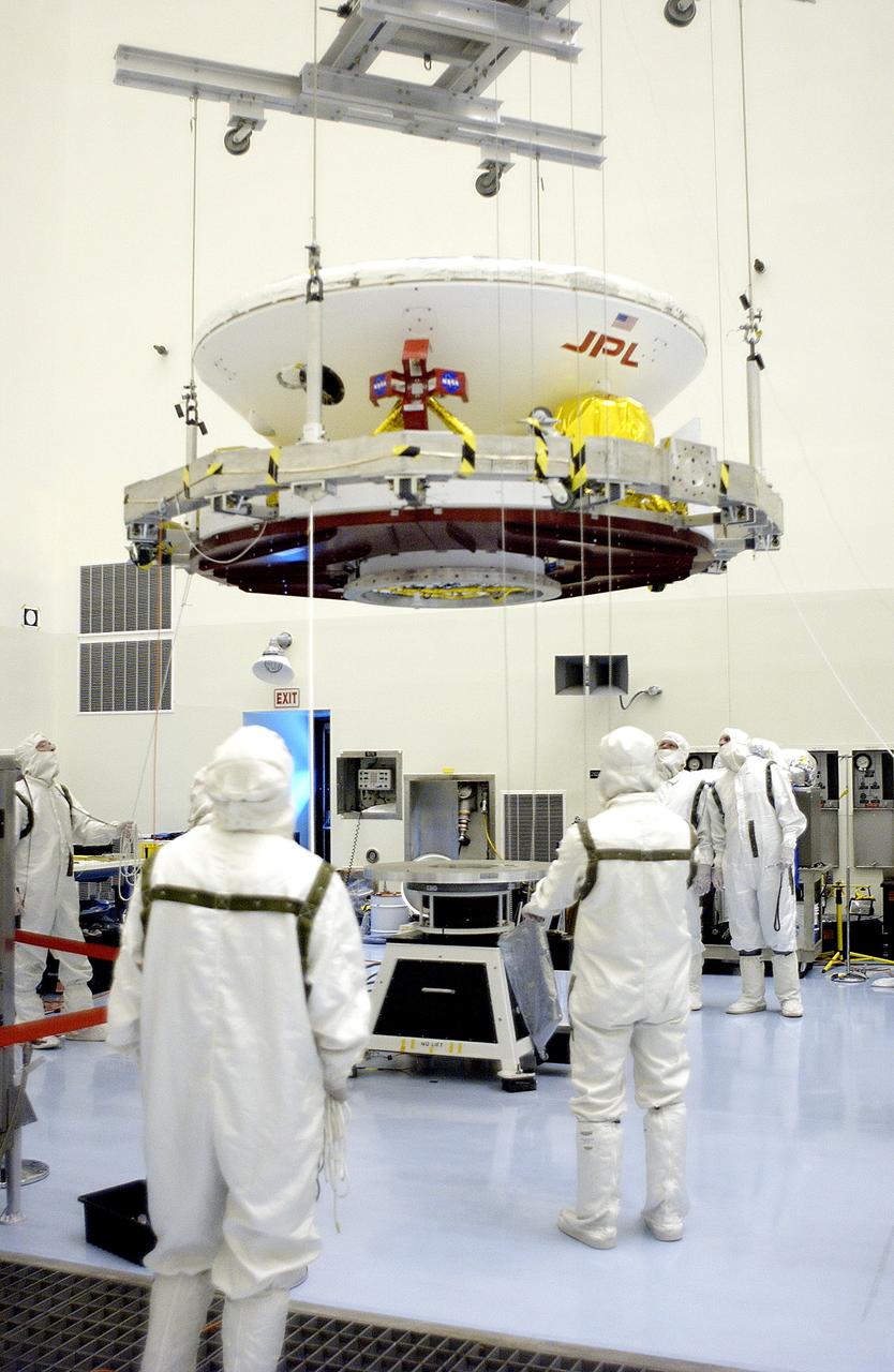 KENNEDY SPACE CENTER, FLA. - In the Payload Hazardous Servicing Facility, the Mars Exploration Rover 2 (MER-2) is moved to a spin table.  NASA’s twin Mars Exploration Rovers are designed to study the history of water on Mars. These robotic geologists are equipped with a robotic arm, a drilling tool, three spectrometers, and four pairs of cameras that allow them to have a human-like, 3D view of the terrain. Each rover could travel as far as 100 meters in one day to act as Mars scientists' eyes and hands, exploring an environment where humans can’t yet go.  The MER-2 is scheduled to launch June 5 from Launch Pad 17-A, Cape Canaveral Air Force Station.