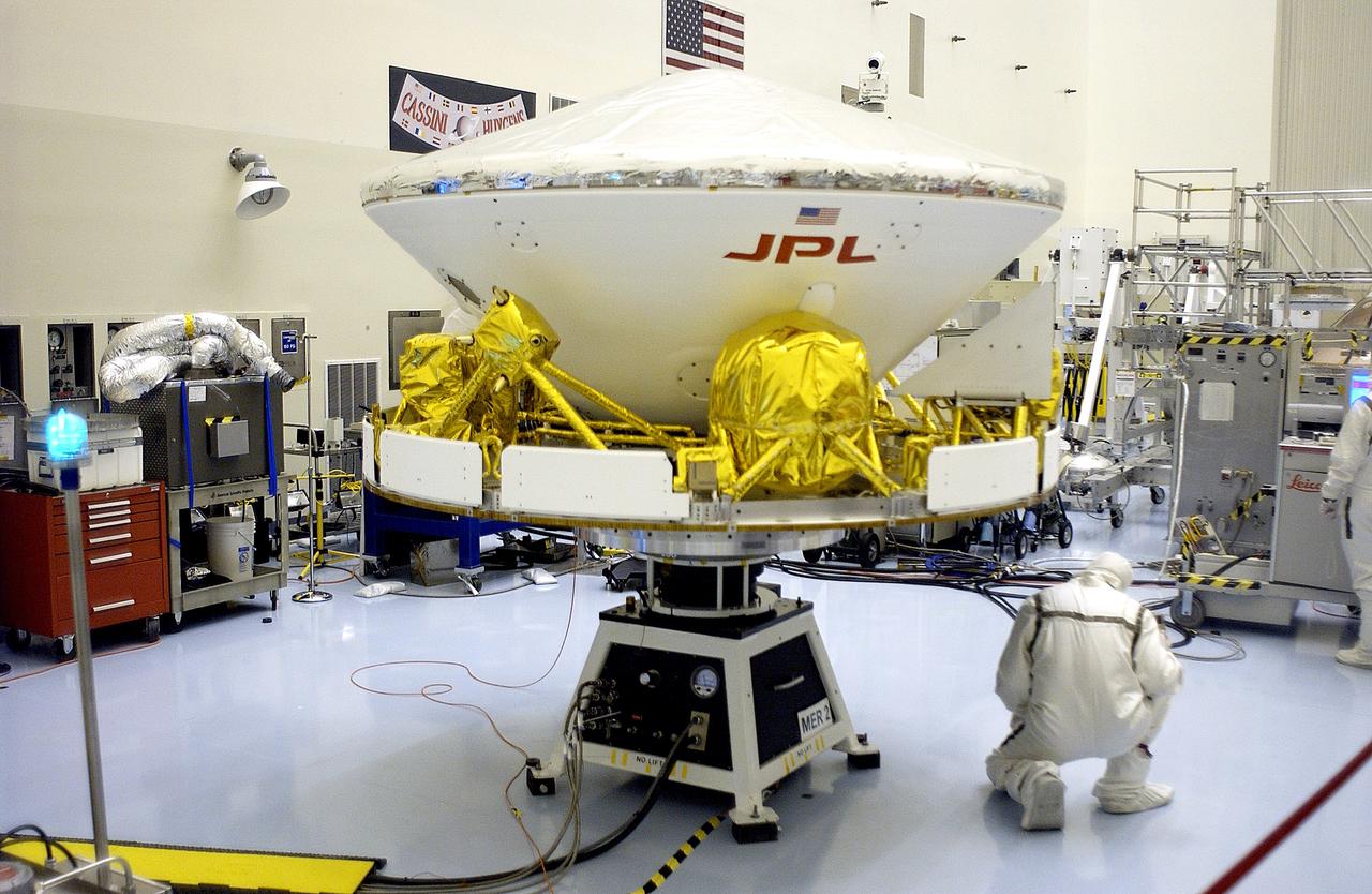 KENNEDY SPACE CENTER, FLA. - The Mars Exploration Rover 2 (MER-2) is ready for a second spin test in the Payload Hazardous Servicing Facility. After mating to the third stage of the Delta II rocket, MER-2 will be transported to the launch pad. NASA’s twin Mars Exploration Rovers are designed to study the history of water on Mars. These robotic geologists are equipped with a robotic arm, a drilling tool, three spectrometers, and four pairs of cameras that allow them to have a human-like, 3D view of the terrain. Each rover could travel as far as 100 meters in one day to act as Mars scientists' eyes and hands, exploring an environment where humans can’t yet go. The MER-2 is scheduled to launch June 5 from Launch Pad 17-A, Cape Canaveral Air Force Station.