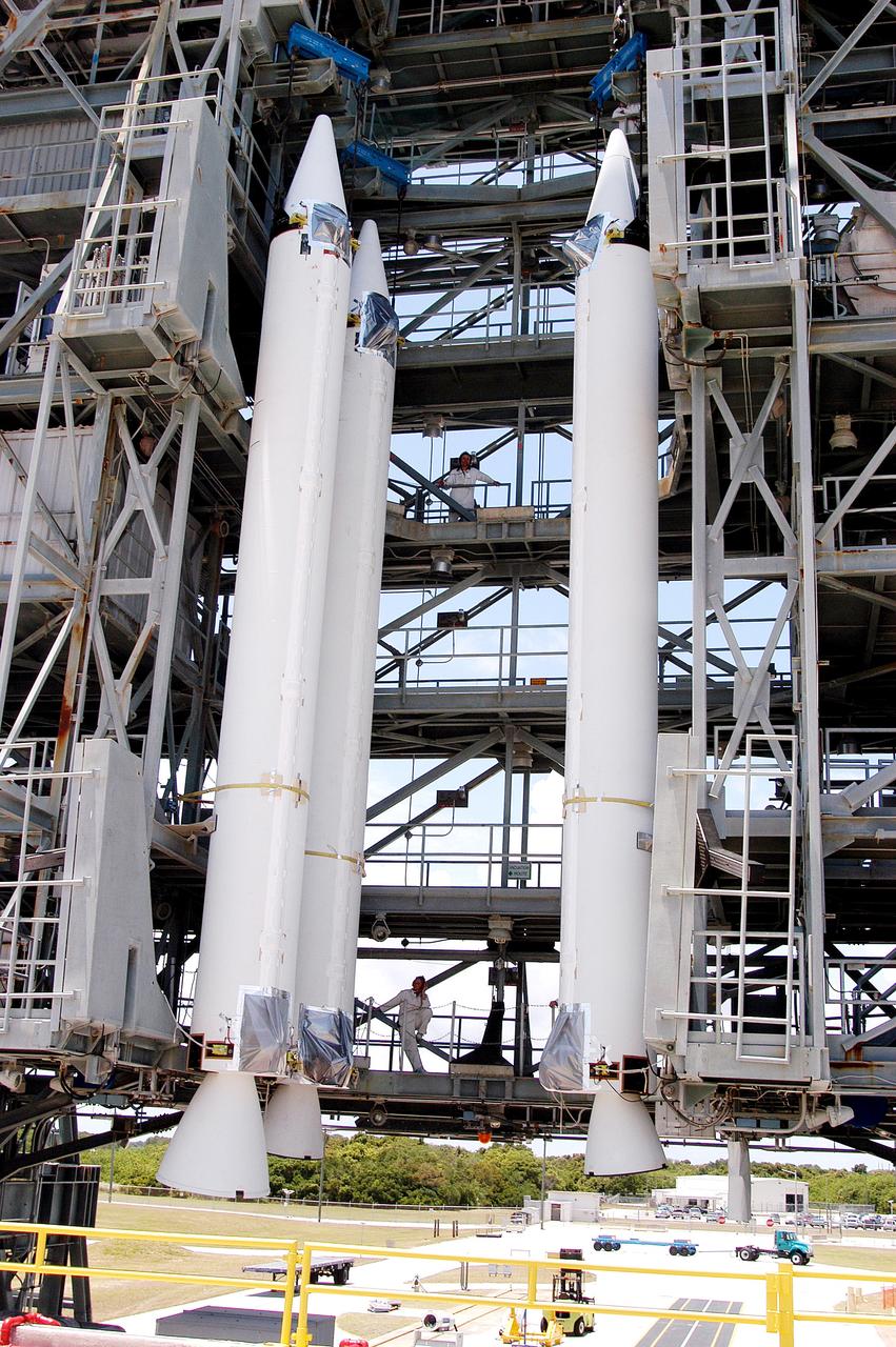 KENNEDY SPACE CENTER, FLA. - Three solid rocket boosters are suspended in the launch tower of Launch Complex 17-B, Cape Canaveral Air Force Station.   They will be mated to the Delta II rocket for the Mars Exploration Rover 1 (MER-1) launch June 25.  NASA’s twin Mars Exploration Rovers are designed to study the history of water on Mars. These robotic geologists are equipped with a robotic arm, a drilling tool, three spectrometers, and four pairs of cameras that allow them to have a human-like, 3D view of the terrain. Each rover could travel as far as 100 meters in one day to act as Mars scientists' eyes and hands, exploring an environment where humans can’t yet go.  MER-2 (MER-A) will launch June 5.