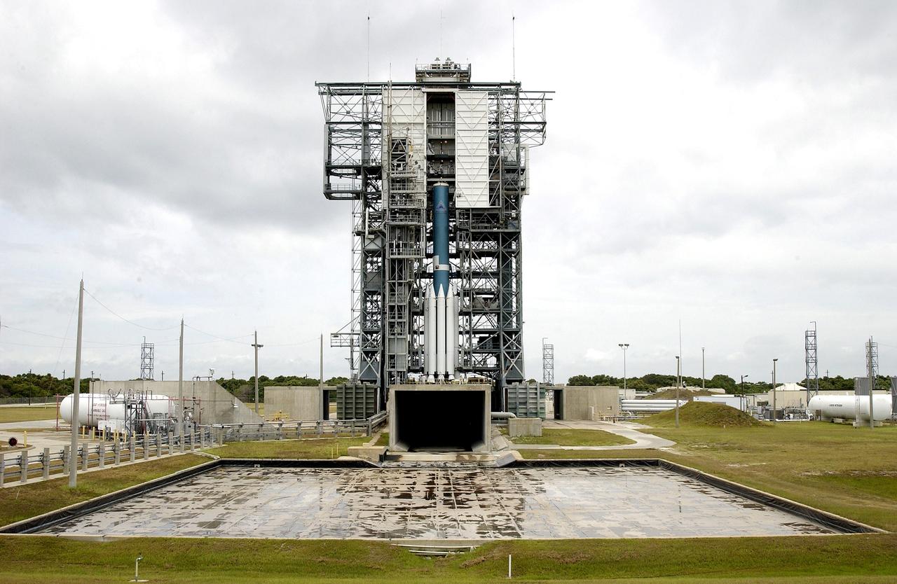 KENNEDY SPACE CENTER, FLA. -  Erection of the Delta II rocket for the Mars Exploration Rover 1 (MER-1) launch on June 25 at Launch Complex 17-B, Cape Canaveral Air Force Station, is under way.  NASA’s twin Mars Exploration Rovers are designed to study the history of water on Mars. These robotic geologists are equipped with a robotic arm, a drilling tool, three spectrometers, and four pairs of cameras that allow them to have a human-like, 3D view of the terrain. Each rover could travel as far as 100 meters in one day to act as Mars scientists' eyes and hands, exploring an environment where humans can’t yet go.  MER-2 (MER-A) will launch June 5.
