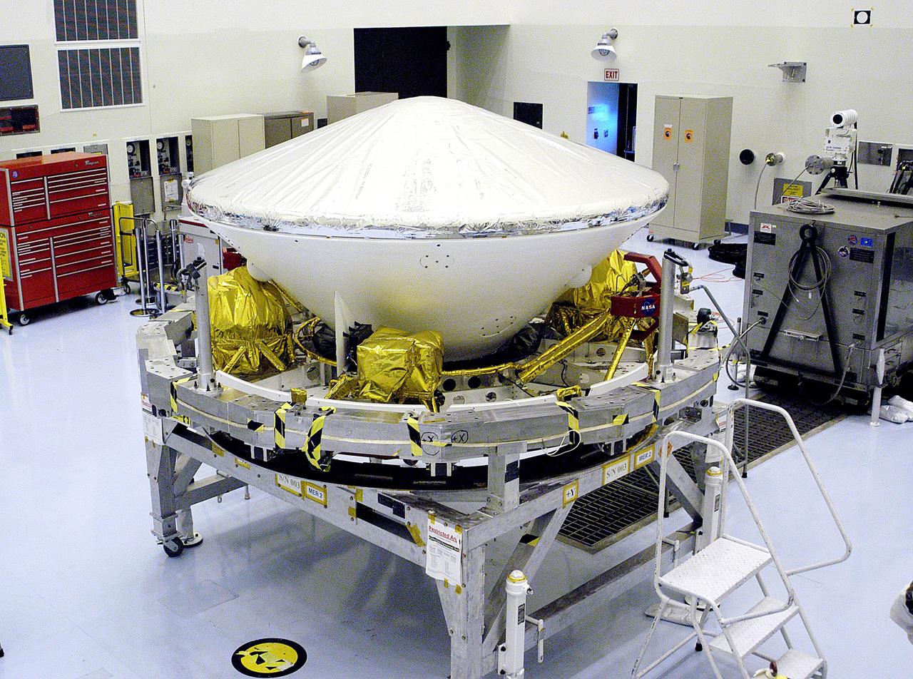 KENNEDY SPACE CENTER, FLA. - In the Payload Hazardous Servicing Facility, the Mars Exploration Rover-1 (MER-B) awaits the next step in its preflight processing.  The rover is scheduled to launch aboard a Delta II rocket on June 25.  NASA’s twin Mars Exploration Rovers are designed to study the history of water on Mars. These robotic geologists are equipped with a robotic arm, a drilling tool, three spectrometers, and four pairs of cameras that allow them to have a human-like, 3D view of the terrain. Each rover could travel as far as 100 meters in one day to act as Mars scientists' eyes and hands, exploring an environment where humans are not yet able to go. The launch of MER-2 (MER-A) is tentatively set for June 8.