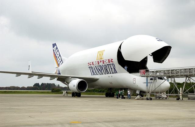 NASA image: KENNEDY SPACE CENTER, FLA. - At the Shuttle Landing Facility, the nose of the Beluga aircraft is open to offload the Italian-built module, U.S. Node 2, for the International Space Station.  The second of three Station connecting modules, Node 2 attaches to the end of the U.S. Lab and provides attach locations for the Japanese laboratory, European laboratory, the Centrifuge Accommodation Module and, later, Multipurpose Logistics Modules. It will provide the primary docking location for the Shuttle when a pressurized mating adapter is attached to Node 2.  Installation of the module will complete  the U.S. Core of the ISS.  Node 2 is the designated payload for mission STS-120.  No orbiter or launch date has been determined yet.