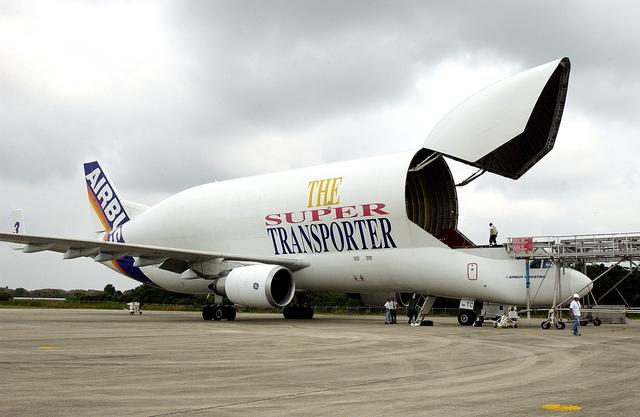 NASA image: KENNEDY SPACE CENTER, FLA. - The Italian-built module, U.S. Node 2, for the International Space Station is offloaded from a Beluga at the Shuttle Landing Facility. The second of three Station connecting modules, Node 2 attaches to the end of the U.S. Lab and provides attach locations for the Japanese laboratory, European laboratory, the Centrifuge Accommodation Module and, later, Multipurpose Logistics Modules. It will provide the primary docking location for the Shuttle when a pressurized mating adapter is attached to Node 2.  Installation of the module will complete  the U.S. Core of the ISS.  Node 2 is the designated payload for mission STS-120.  No orbiter or launch date has been determined yet.