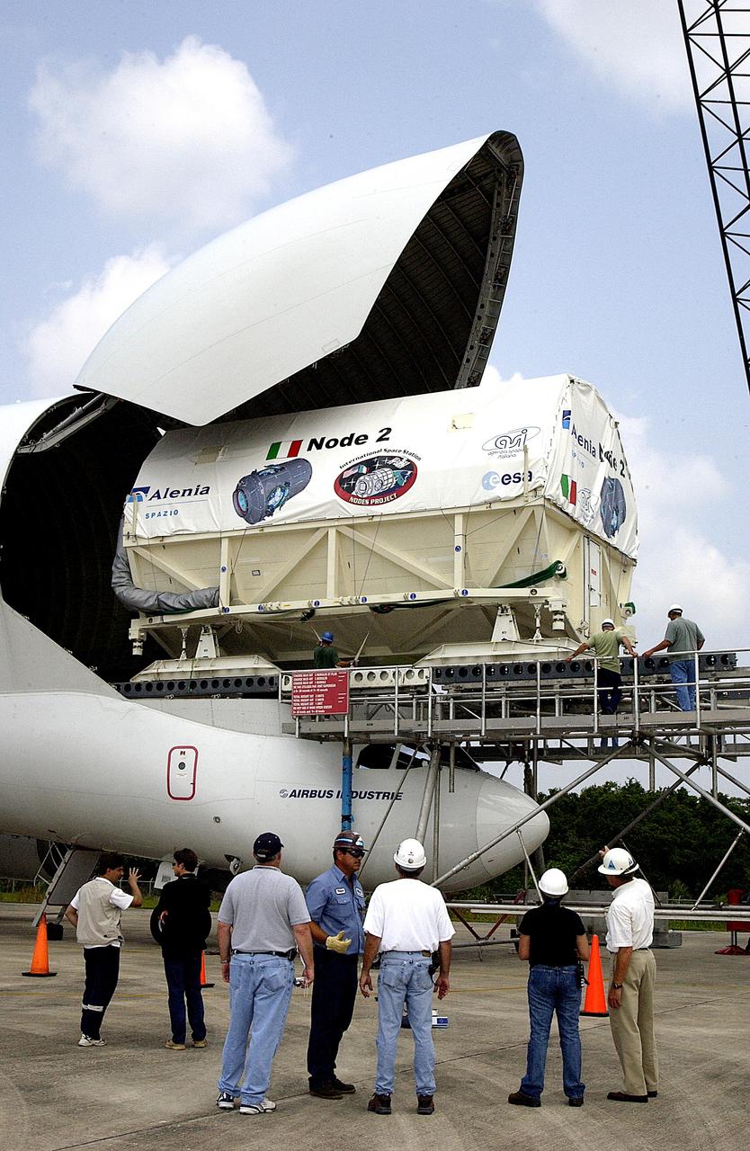 KENNEDY SPACE CENTER, FLA. - The Italian-built module, U.S. Node 2, for the International Space Station is offloaded from a Beluga aircraft at the Shuttle Landing Facility.  The second of three Station connecting modules, Node 2 attaches to the end of the U.S. Lab and provides attach locations for the Japanese laboratory, European laboratory, the Centrifuge Accommodation Module and, later, Multipurpose Logistics Modules. It will provide the primary docking location for the Shuttle when a pressurized mating adapter is attached to Node 2.  Installation of the module will complete  the U.S. Core of the ISS.  Node 2 is the designated payload for mission STS-120.  No orbiter or launch date has been determined yet.