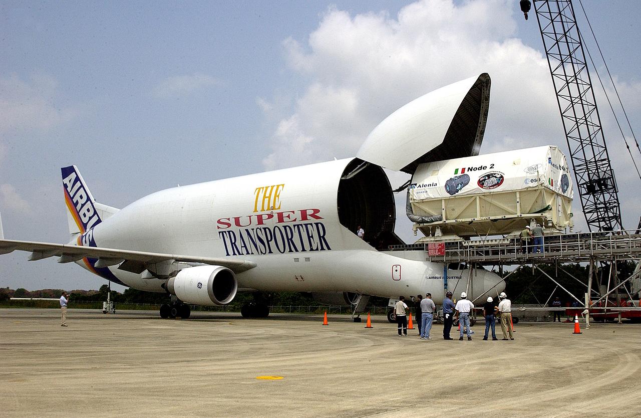 KENNEDY SPACE CENTER, FLA. - The Italian-built module, U.S. Node 2, for the International Space Station is offloaded from a Beluga aircraft at the Shuttle Landing Facility. The second of three Station connecting modules, Node 2 attaches to the end of the U.S. Lab and provides attach locations for the Japanese laboratory, European laboratory, the Centrifuge Accommodation Module and, later, Multipurpose Logistics Modules. It will provide the primary docking location for the Shuttle when a pressurized mating adapter is attached to Node 2.  Installation of the module will complete  the U.S. Core of the ISS.  Node 2 is the designated payload for mission STS-120.  No orbiter or launch date has been determined yet.