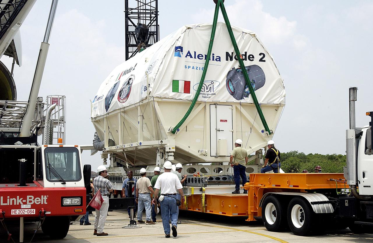 KENNEDY SPACE CENTER, FLA. -  The Italian-built module, U.S. Node 2, is secured on a transporter after its arrival at the Shuttle Landing Facility.  It will be taken to the Space Station Processing Facility.  The second of three connecting modules on the International Space Station, Node 2 attaches to the end of the U.S. Lab and provides attach locations for the Japanese laboratory, European laboratory, the Centrifuge Accommodation Module and, later, Multipurpose Logistics Modules. It will provide the primary docking location for the Shuttle when a pressurized mating adapter is attached to Node 2.  Installation of the module will complete  the U.S. Core of the ISS.  Node 2 is the designated payload for mission STS-120.  No orbiter or launch date has been determined yet.