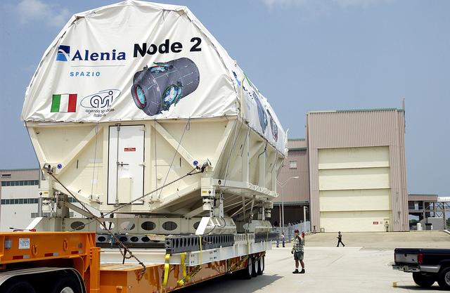 NASA image: KENNEDY SPACE CENTER, FLA. -  The Italian-built module, U.S. Node 2, nears the Space Station Processing Facility after its move from the Shuttle Landing Facility. The second of three connecting modules on the International Space Station, Node 2 attaches to the end of the U.S. Lab and provides attach locations for the Japanese laboratory, European laboratory, the Centrifuge Accommodation Module and, later, Multipurpose Logistics Modules. It will provide the primary docking location for the Shuttle when a pressurized mating adapter is attached to Node 2.  Installation of the module will complete  the U.S. Core of the ISS.  Node 2 is the designated payload for mission STS-120.  No orbiter or launch date has been determined yet.