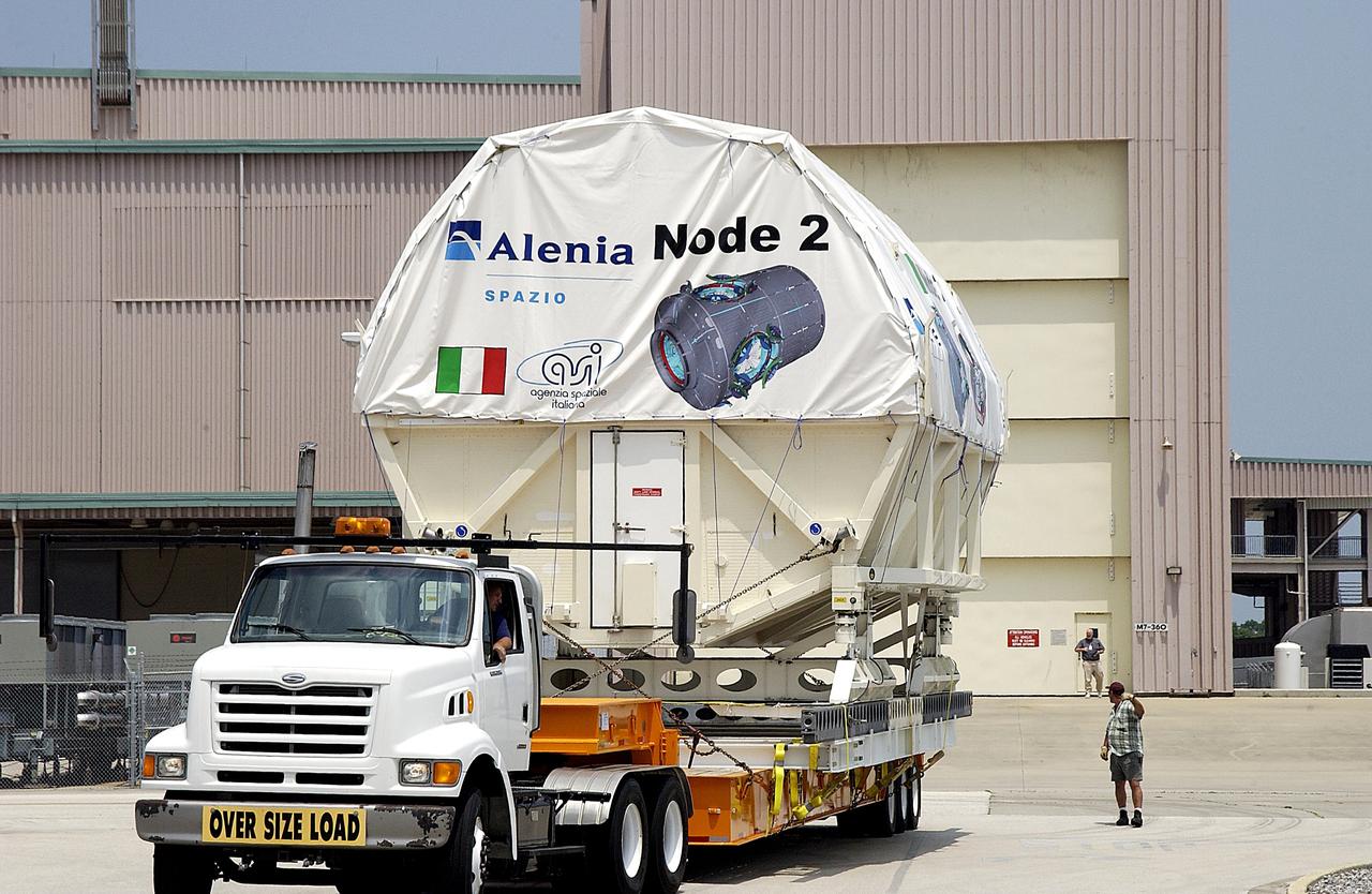KENNEDY SPACE CENTER, FLA. -  The Italian-built module, U.S. Node 2, arrives at the Space Station Processing Facility after its move from the Shuttle Landing Facility. The second of three connecting modules on the International Space Station, Node 2 attaches to the end of the U.S. Lab and provides attach locations for the Japanese laboratory, European laboratory, the Centrifuge Accommodation Module and, later, Multipurpose Logistics Modules. It will provide the primary docking location for the Shuttle when a pressurized mating adapter is attached to Node 2.  Installation of the module will complete  the U.S. Core of the ISS.  Node 2 is the designated payload for mission STS-120.  No orbiter or launch date has been determined yet.