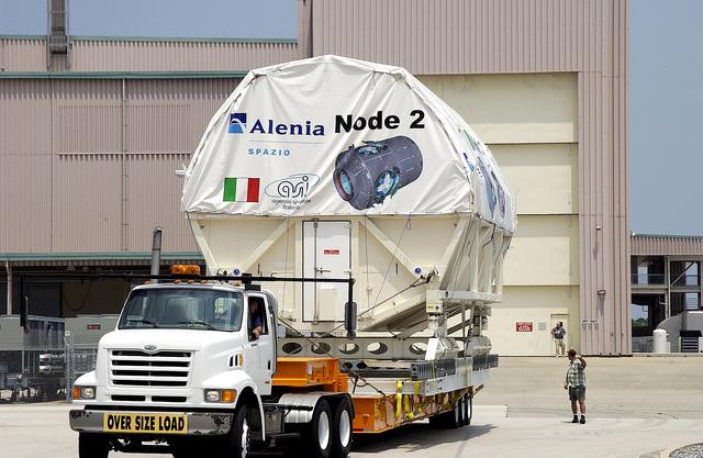 KENNEDY SPACE CENTER, FLA. -  The Italian-built module, U.S. Node 2, arrives at the Space Station Processing Facility after its move from the Shuttle Landing Facility. The second of three connecting modules on the International Space Station, Node 2 attaches to the end of the U.S. Lab and provides attach locations for the Japanese laboratory, European laboratory, the Centrifuge Accommodation Module and, later, Multipurpose Logistics Modules. It will provide the primary docking location for the Shuttle when a pressurized mating adapter is attached to Node 2.  Installation of the module will complete  the U.S. Core of the ISS.  Node 2 is the designated payload for mission STS-120.  No orbiter or launch date has been determined yet.