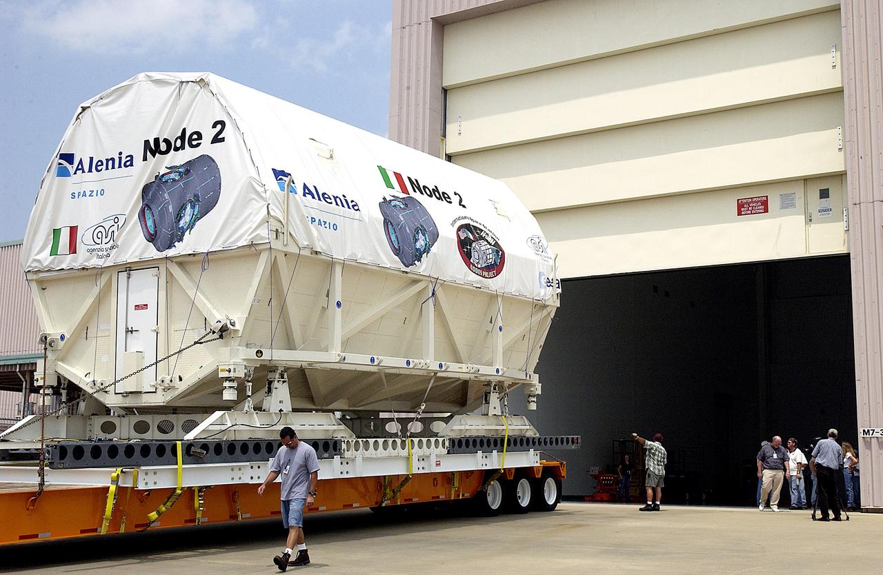 KENNEDY SPACE CENTER, FLA. -  The Italian-built module, U.S. Node 2, waits at the Space Station Processing Facility for the door to open. The second of three connecting modules on the International Space Station, Node 2 attaches to the end of the U.S. Lab and provides attach locations for the Japanese laboratory, European laboratory, the Centrifuge Accommodation Module and, later, Multipurpose Logistics Modules. It will provide the primary docking location for the Shuttle when a pressurized mating adapter is attached to Node 2.  Installation of the module will complete  the U.S. Core of the ISS.  Node 2 is the designated payload for mission STS-120.  No orbiter or launch date has been determined yet.