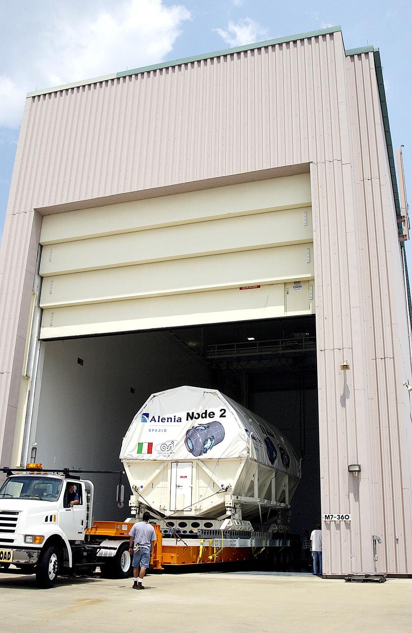 KENNEDY SPACE CENTER, FLA. -  The Italian-built module, U.S. Node 2, is moved into the Space Station Processing Facility. The second of three connecting modules on the International Space Station, Node 2 attaches to the end of the U.S. Lab and provides attach locations for the Japanese laboratory, European laboratory, the Centrifuge Accommodation Module and, later, Multipurpose Logistics Modules. It will provide the primary docking location for the Shuttle when a pressurized mating adapter is attached to Node 2.  Installation of the module will complete  the U.S. Core of the ISS.  Node 2 is the designated payload for mission STS-120.  No orbiter or launch date has been determined yet.