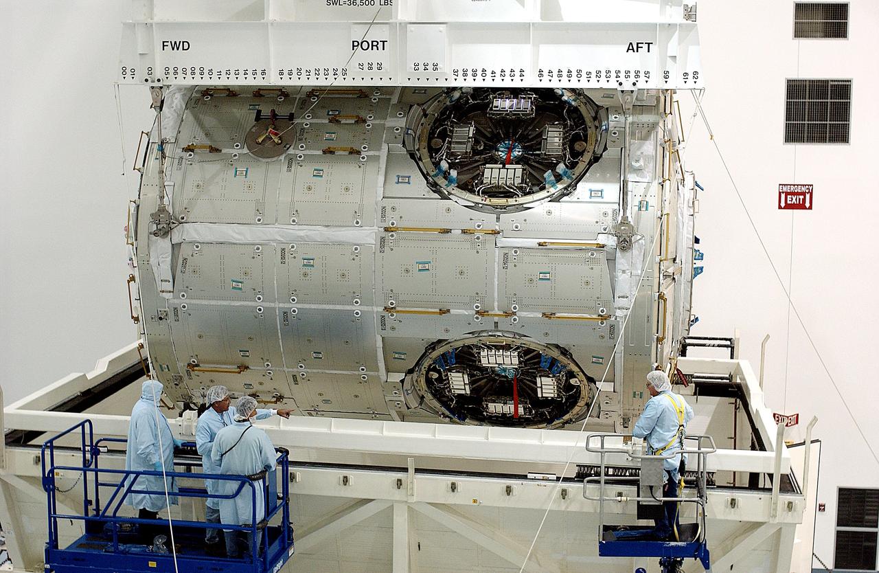 KENNEDY SPACE CENTER, FLA. - An overhead crane in the Space Station Processing Facility lifts the U.S. Node 2 out of its shipping container.  The node will be moved to a workstand.  The second of three connecting modules on the International Space Station, the Italian-built Node 2 attaches to the end of the U.S. Lab and provides attach locations for the Japanese laboratory, European laboratory, the Centrifuge Accommodation Module and, later, Multipurpose Logistics Modules. It will provide the primary docking location for the Shuttle when a pressurized mating adapter is attached to Node 2.  Installation of the module will complete  the U.S. Core of the ISS.  Node 2 is the designated payload for mission STS-120.  No orbiter or launch date has been determined yet.