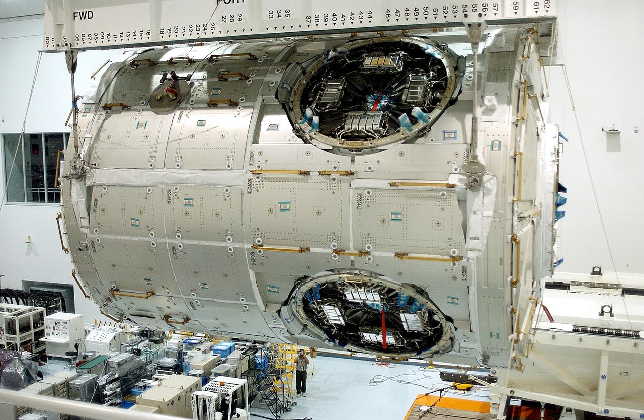 KENNEDY SPACE CENTER, FLA. - An overhead crane in the Space Station Processing Facility moves the U.S. Node 2 across the floor to a workstand.  The second of three connecting modules on the International Space Station, the Italian-built Node 2 attaches to the end of the U.S. Lab and provides attach locations for the Japanese laboratory, European laboratory, the Centrifuge Accommodation Module and, later, Multipurpose Logistics Modules. It will provide the primary docking location for the Shuttle when a pressurized mating adapter is attached to Node 2.  Installation of the module will complete  the U.S. Core of the ISS.  Node 2 is the designated payload for mission STS-120.  No orbiter or launch date has been determined yet.