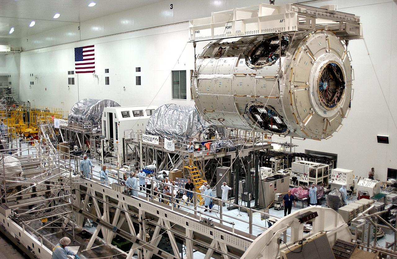 KENNEDY SPACE CENTER, FLA. - The U.S. Node 2 is moved toward a workstand in the Space Station Processing Facility.  The second of three connecting modules on the International Space Station, the Italian-built Node 2 attaches to the end of the U.S. Lab and provides attach locations for the Japanese laboratory, European laboratory, the Centrifuge Accommodation Module and, later, Multipurpose Logistics Modules. It will provide the primary docking location for the Shuttle when a pressurized mating adapter is attached to Node 2.  Installation of the module will complete  the U.S. Core of the ISS.  Node 2 is the designated payload for mission STS-120.  No orbiter or launch date has been determined yet.