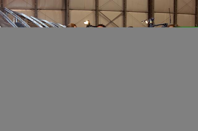 KENNEDY SPACE CENTER, FLA. -  In the Columbia Debris Hangar,  Shuttle Launch Director Mike Leinbach  talks to the media about activities that have taken place since the Columbia accident on Feb. 1, 2003.  Behind him is a model of the left wing of the orbiter.  STS-107 debris recovery and reconstruction operations are winding down.  To date, nearly 84,000 pieces of debris have been recovered and sent to KSC. That represents about 38 percent of the dry weight of Columbia, equaling almost 85,000 pounds.