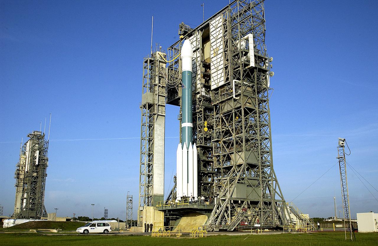 KENNEDY SPACE CENTER, FLA. -  The Mobile Service Tower is rolled back at Launch Complex 17A to reveal a Delta II rocket ready to launch the Mars Exploration Rover-A mission.  NASA's twin Mars Exploration Rovers are designed to study the history of water on Mars. These robotic geologists are equipped with a robotic arm, a drilling tool, three spectrometers, and four pairs of cameras that allow them to have a human-like, 3D view of the terrain. Each rover could travel as far as 100 meters in one day to act as Mars scientists' eyes and hands, exploring an environment where humans are not yet able to go. MER-A, with the rover Spirit aboard, is scheduled to launch on June 8 at 2:06 p.m. EDT, with two launch opportunities each day during a launch period that closes on June 24.