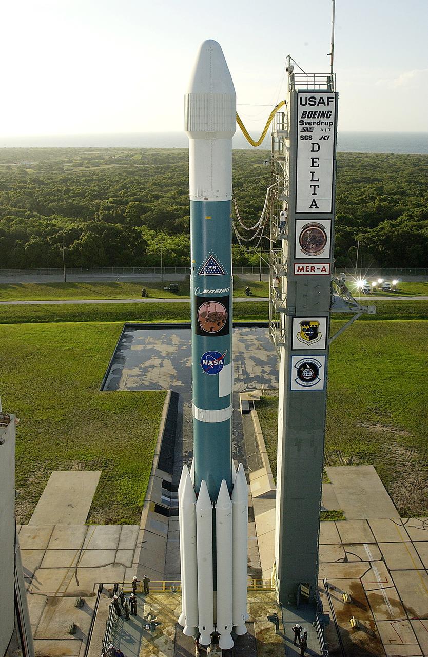 KENNEDY SPACE CENTER, FLA. -  The Mobile Service Tower is rolled back at Launch Complex 17A to reveal a Delta II rocket ready to launch the Mars Exploration Rover-A mission.  NASA's twin Mars Exploration Rovers are designed to study the history of water on Mars. These robotic geologists are equipped with a robotic arm, a drilling tool, three spectrometers, and four pairs of cameras that allow them to have a human-like, 3D view of the terrain. Each rover could travel as far as 100 meters in one day to act as Mars scientists' eyes and hands, exploring an environment where humans are not yet able to go. MER-A, with the rover Spirit aboard, is scheduled to launch on June 8 at 2:06 p.m. EDT, with two launch opportunities each day during a launch period that closes on June 24.