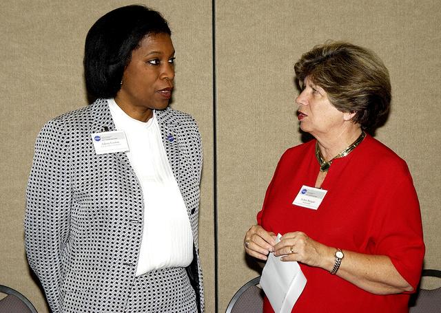 NASA image: KENNEDY SPACE CENTER, FLA. -    KSC Director of External Relations and Business Development JoAnn Morgan talks with Dr. Adena Williams Loston at a reception and dinner at the Debus Conference Center June 6.  Loston is NASA’s new associate administrator of Education and the reception was in her honor.  Loston was previously NASA Administrator Sean O’Keefe’s senior advisor of education and assumed her new position in October 2002.   KSC Director Roy Bridges Jr. also attended the reception to welcome Loston during her visit to the Center.