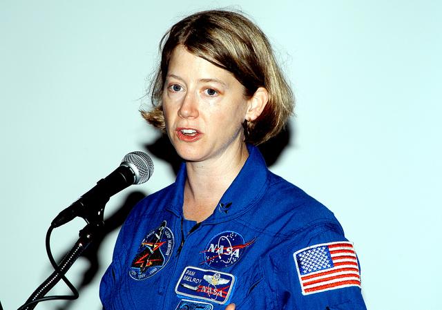 NASA image: KENNEDY SPACE CENTER, FLA. -    At the Florida Commission on the Status of Women held June 7 at the Debus Conference Facility, astronaut Pamela Melroy speaks to attendees.  Melroy has served as pilot on two Shuttle flights (STS-92 in 2000 and STS-112 in 2002), and has logged more than 562 hours in space. The commission, through coordinating, researching, communicating, and encouraging legislation, is dedicated to empowering women from all walks of life in achieving their fullest potential, to eliminating barriers to that achievement, and to recognizing women’s accomplishments.