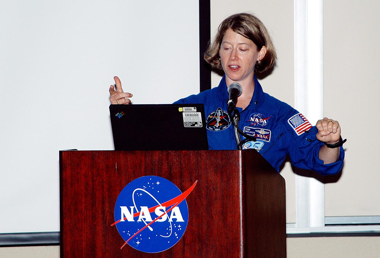 KENNEDY SPACE CENTER, FLA. -    At the Florida Commission on the Status of Women held June 7 at the Debus Conference Facility, astronaut Pamela Melroy speaks to attendees.  Melroy has served as pilot on two Shuttle flights (STS-92 in 2000 and STS-112 in 2002), and has logged more than 562 hours in space. The commission, through coordinating, researching, communicating, and encouraging legislation, is dedicated to empowering women from all walks of life in achieving their fullest potential, to eliminating barriers to that achievement, and to recognizing women’s accomplishments.
