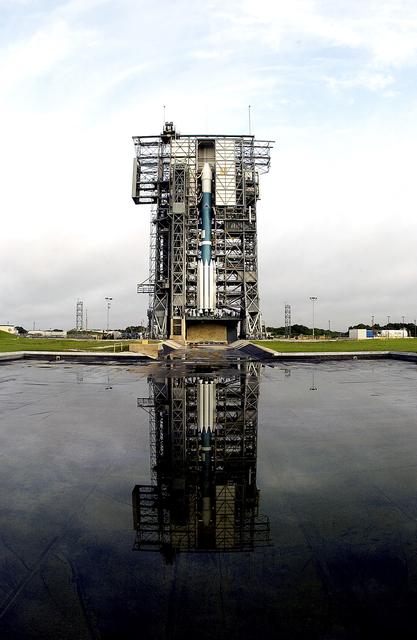 NASA image: KENNEDY SPACE CENTER, FLA. -  On Launch Complex 17-A, Cape Canaveral Air Force Station, the Boeing Delta II rocket and Mars Exploration Rover 2 (MER-A) are ready for the third launch attempt after weather concerns postponed earlier attempts.   MER-A is the first of two rovers being launched to Mars.  When the two rovers arrive at Mars in 2004, they will bounce to airbag-cushioned landings at sites offering a balance of favorable conditions for safe landings and interesting science. The rovers see sharper images, can explore farther and examine rocks better than anything that has ever landed on Mars.  The designated site for MER-A mission is Gusev Crater, which appears to have been a crater lake.  The second rover, MER-B, is scheduled to launch June 25.