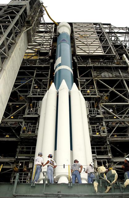 NASA image: KENNEDY SPACE CENTER, FLA. -   On Launch Complex 17-A, Cape Canaveral Air Force Station, the launch tower begins to roll back from the Boeing Delta II rocket and its Mars Exploration Rover (MER-A) payload in preparation for another launch attempt.  The first two attempts were postponed due to weather concerns.  MER-A is the first of two rovers being launched to Mars.  When the two rovers arrive at Mars in 2004, they will bounce to airbag-cushioned landings at sites offering a balance of favorable conditions for safe landings and interesting science. The rovers see sharper images, can explore farther and examine rocks better than anything that has ever landed on Mars.  The designated site for MER-A mission is Gusev Crater, which appears to have been a crater lake.  The second rover, MER-B, is scheduled to launch June 25.