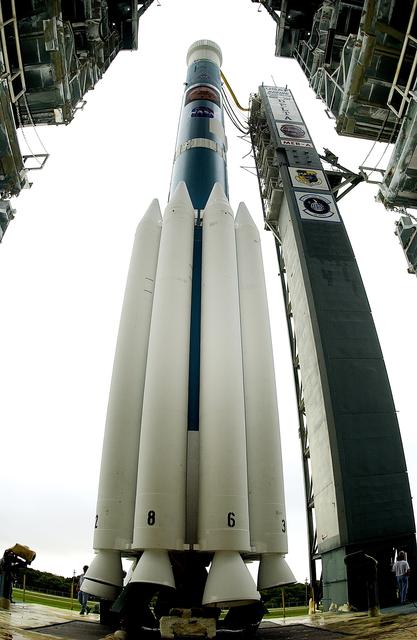 NASA image: KENNEDY SPACE CENTER, FLA. -   On Launch Complex 17-A, Cape Canaveral Air Force Station, the Boeing Delta II rocket and its Mars Exploration Rover (MER-A) payload are viewed as the launch tower overhead rolls back.   This will be the third launch attempt in as many days after weather concerns postponed the launches June 8 and June 9.  MER-A is the first of two rovers being launched to Mars.  When the two rovers arrive at Mars in 2004, they will bounce to airbag-cushioned landings at sites offering a balance of favorable conditions for safe landings and interesting science. The rovers see sharper images, can explore farther and examine rocks better than anything that has ever landed on Mars.  The designated site for MER-A mission is Gusev Crater, which appears to have been a crater lake.  The second rover, MER-B, is scheduled to launch June 25.