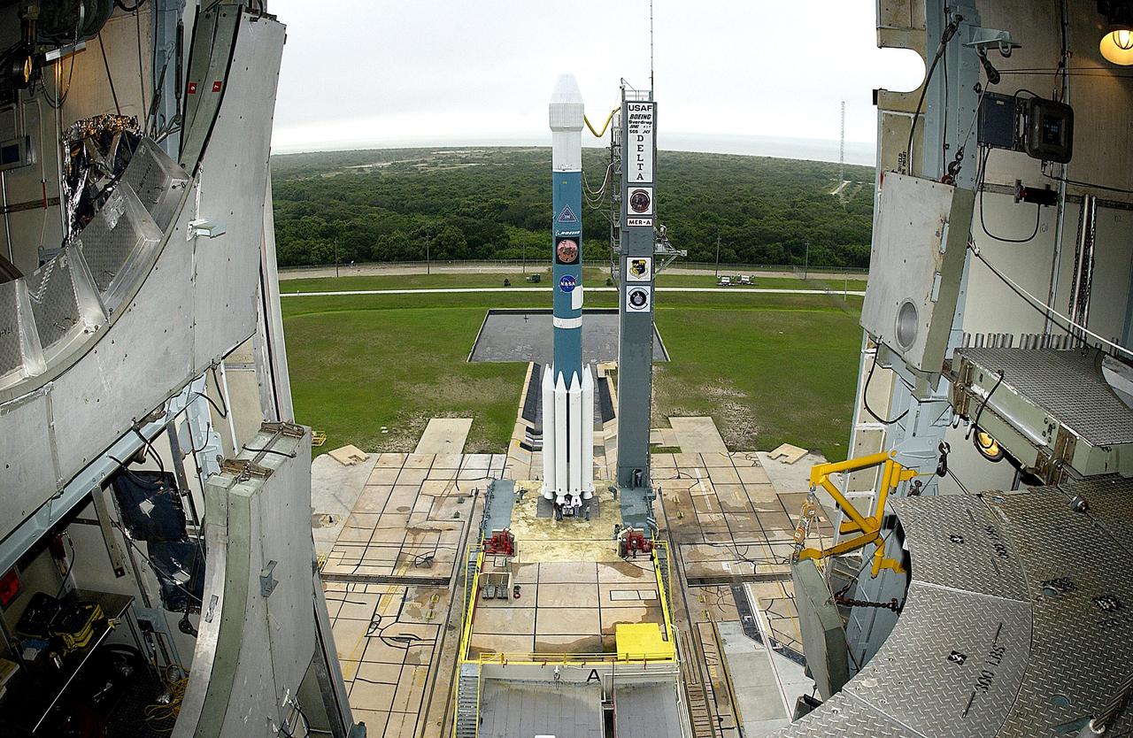 KENNEDY SPACE CENTER, FLA. -  On Launch Complex 17-A, Cape Canaveral Air Force Station, the Boeing Delta II rocket and its Mars Exploration Rover (MER-A) payload are free of the tower  and ready for launch.  This will be the third launch attempt in as many days after weather concerns postponed the launches June 8 and June 9.  MER-A is the first of two rovers being launched to Mars.  When the two rovers arrive at Mars in 2004, they will bounce to airbag-cushioned landings at sites offering a balance of favorable conditions for safe landings and interesting science. The rovers see sharper images, can explore farther and examine rocks better than anything that has ever landed on Mars.  The designated site for MER-A mission is Gusev Crater, which appears to have been a crater lake.  The second rover, MER-B, is scheduled to launch June 25.