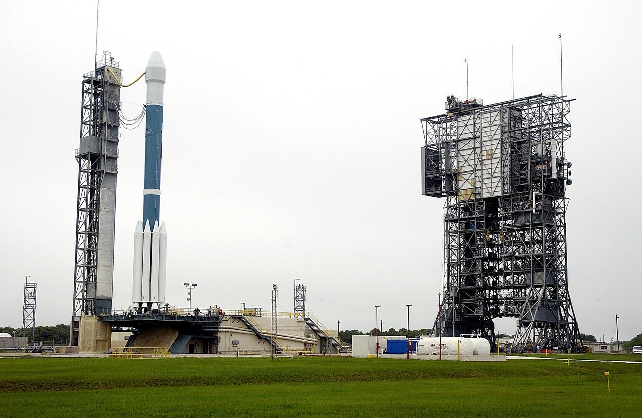 KENNEDY SPACE CENTER, FLA. -  On Launch Complex 17-A, Cape Canaveral Air Force Station, the Boeing Delta II rocket and its Mars Exploration Rover (MER-A) payload are free of the tower (right) and ready for launch.  This will be the third launch attempt in as many days after weather concerns postponed the launches June 8 and June 9.  MER-A is the first of two rovers being launched to Mars.  When the two rovers arrive at Mars in 2004, they will bounce to airbag-cushioned landings at sites offering a balance of favorable conditions for safe landings and interesting science. The rovers see sharper images, can explore farther and examine rocks better than anything that has ever landed on Mars.  The designated site for MER-A mission is Gusev Crater, which appears to have been a crater lake.  The second rover, MER-B, is scheduled to launch June 25.