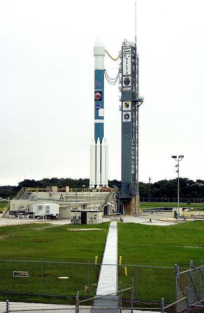 NASA image: KENNEDY SPACE CENTER, FLA. -  On Launch Complex 17-A, Cape Canaveral Air Force Station, the Boeing Delta II rocket and its Mars Exploration Rover (MER-A) payload are free of the tower  and ready for launch.  This will be the third launch attempt in as many days after weather concerns postponed the launches June 8 and June 9.  MER-A is the first of two rovers being launched to Mars.  When the two rovers arrive at the red planet in 2004, they will bounce to airbag-cushioned landings at sites offering a balance of favorable conditions for safe landings and interesting science. The rovers see sharper images, can explore farther and examine rocks better than anything that has ever landed on Mars.  The designated site for MER-A mission is Gusev Crater, which appears to have been a crater lake.  The second rover, MER-B, is scheduled to launch June 25.