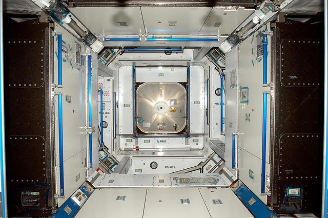 NASA image: KENNEDY SPACE CENTER, FLA. -  The inside of the Italian-built Node 2 looks pristine after opening of the hatch.  A future element of the International Space Station,  Node 2 arrived at KSC June 1.  The second of three Station connecting modules, Node 2 attaches to the end of the U.S. Lab and provides attach locations for the Japanese laboratory, European laboratory, the Centrifuge Accommodation Module and, later, Multipurpose Logistics Modules. It will provide the primary docking location for the Shuttle when a pressurized mating adapter is attached to Node 2.  Installation of the module will complete  the U.S. Core of the ISS.  Node 2 is the designated payload for mission STS-120.  No orbiter or launch date has been determined yet.