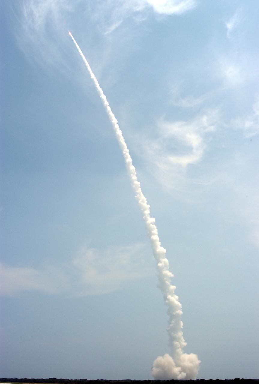 A trail of smoke is all that identifies the Delta II rocket with its Mars Exploration Rover (MER-A) payload as it hurtles into space. Liftoff occurred on time at 1:58 p.m. EDT from Launch Complex 17-A, Cape Canaveral Air Force Station. MER-A, known as "Spirit," is the first of two rovers being launched to Mars. When the two rovers arrive at the red planet in 2004, they will bounce to airbag-cushioned landings at sites offering a balance of favorable conditions for safe landings and interesting science. The rovers see sharper images, can explore farther and examine rocks better than anything that has ever landed on Mars. The designated site for the MER-A mission is Gusev Crater, which appears to have been a crater lake. The second rover, MER-B, is scheduled to launch June 25.