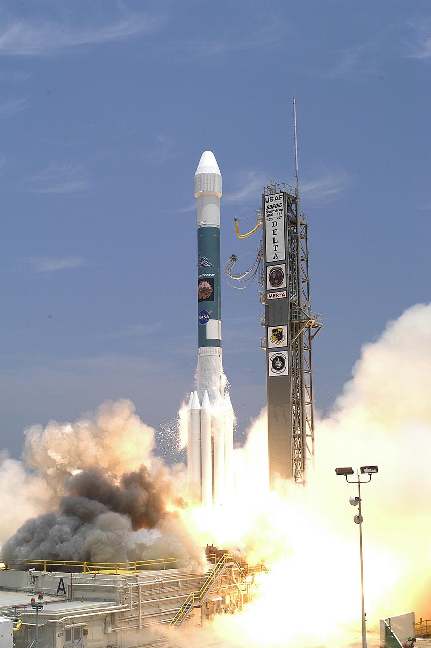 KENNEDY SPACE CENTER, FLA. - Amid billows of smoke and steam, the Delta II rocket with its Mars Exploration Rover (MER-A) payload lifts off the pad on time at 1:58 p.m. EDT from Launch Complex 17-A, Cape Canaveral Air Force Station. MER-A, known as "Spirit," is the first of two rovers being launched to Mars. When the two rovers arrive at the red planet in 2004, they will bounce to airbag-cushioned landings at sites offering a balance of favorable conditions for safe landings and interesting science. The rovers see sharper images, can explore farther and examine rocks better than anything that has ever landed on Mars. The designated site for the MER-A mission is Gusev Crater, which appears to have been a crater lake. The second rover, MER-B, is scheduled to launch June 25.