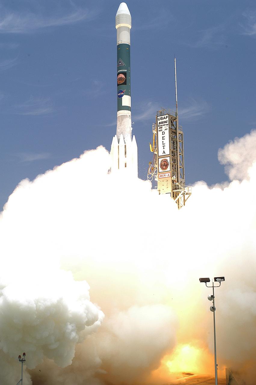 KENNEDY SPACE CENTER, FLA. - Leaving smoke and steam behind, the Delta II rocket with its Mars Exploration Rover (MER-A) payload lifts off the pad on time at 1:58 p.m. EDT from Launch Complex 17-A, Cape Canaveral Air Force Station. MER-A, known as "Spirit," is the first of two rovers being launched to Mars. When the two rovers arrive at the red planet in 2004, they will bounce to airbag-cushioned landings at sites offering a balance of favorable conditions for safe landings and interesting science. The rovers see sharper images, can explore farther and examine rocks better than anything that has ever landed on Mars. The designated site for the MER-A mission is Gusev Crater, which appears to have been a crater lake. The second rover, MER-B, is scheduled to launch June 25.