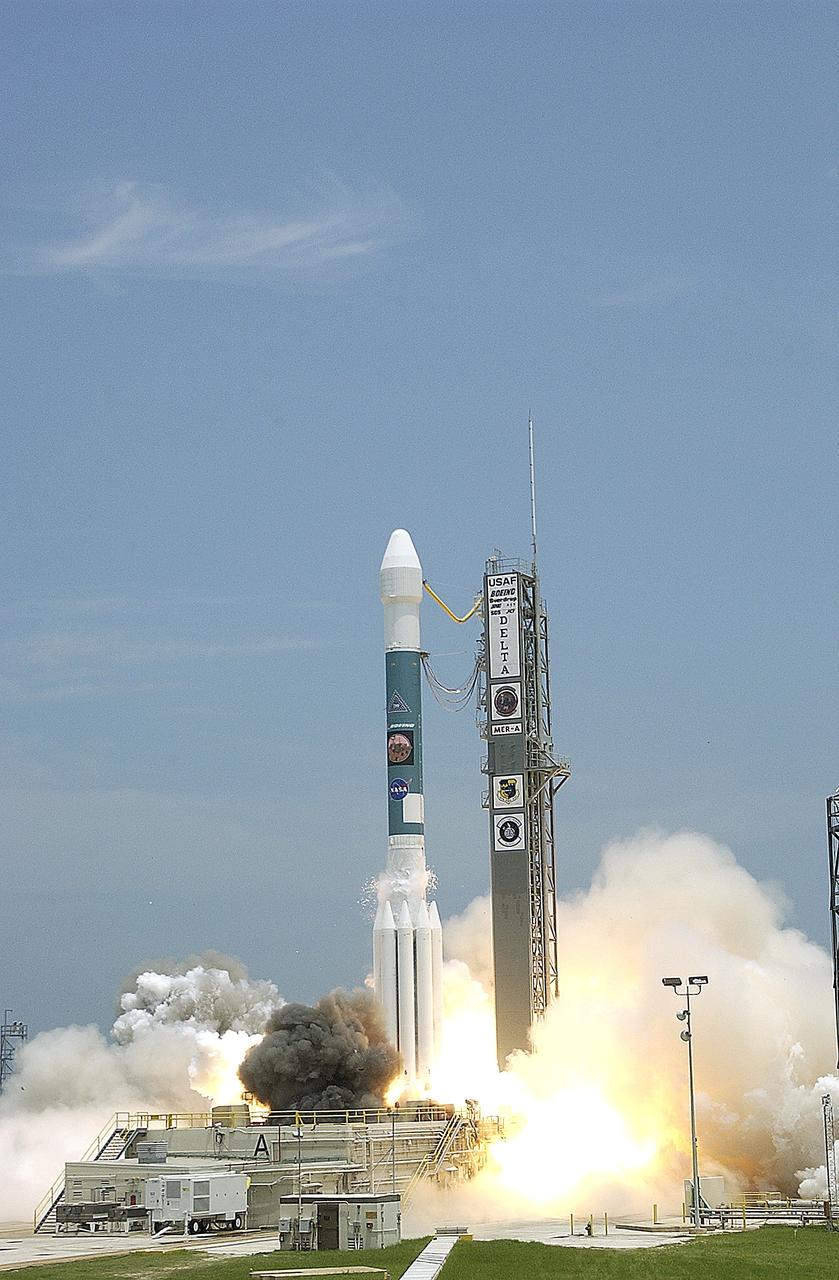KENNEDY SPACE CENTER, FLA. - Blue sky and sun give a dramatic backdrop for the launch of  the Delta II rocket with its Mars Exploration Rover (MER-A) payload.  Liftoff occurred on time at 1:58 p.m. EDT from Launch Complex 17-A, Cape Canaveral Air Force Station. MER-A, known as "Spirit," is the first of two rovers being launched to Mars. When the two rovers arrive at the red planet in 2004, they will bounce to airbag-cushioned landings at sites offering a balance of favorable conditions for safe landings and interesting science. The rovers see sharper images, can explore farther and examine rocks better than anything that has ever landed on Mars. The designated site for the MER-A mission is Gusev Crater, which appears to have been a crater lake. The second rover, MER-B, is scheduled to launch June 25.