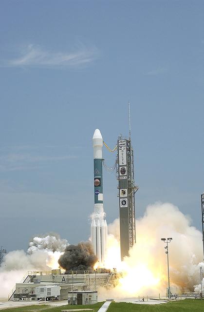 KENNEDY SPACE CENTER, FLA. - Blue sky and sun give a dramatic backdrop for the launch of  the Delta II rocket with its Mars Exploration Rover (MER-A) payload.  Liftoff occurred on time at 1:58 p.m. EDT from Launch Complex 17-A, Cape Canaveral Air Force Station. MER-A, known as "Spirit," is the first of two rovers being launched to Mars. When the two rovers arrive at the red planet in 2004, they will bounce to airbag-cushioned landings at sites offering a balance of favorable conditions for safe landings and interesting science. The rovers see sharper images, can explore farther and examine rocks better than anything that has ever landed on Mars. The designated site for the MER-A mission is Gusev Crater, which appears to have been a crater lake. The second rover, MER-B, is scheduled to launch June 25.