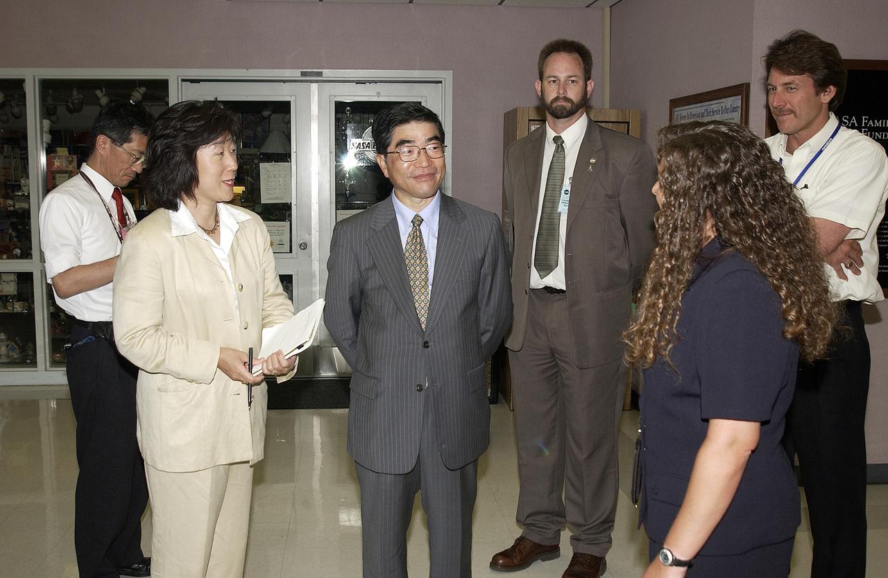KENNEDY SPACE CENTER, FLA. -  In the Space Station Processing Facility, Executive Director of NASDA Koji Yamamoto (center) joins others for a tour.  Mr. Yamamoto is at KSC for a welcome ceremony involving the arrival of the newest Space Station module, the Japanese Experiment Module/pressurized module.