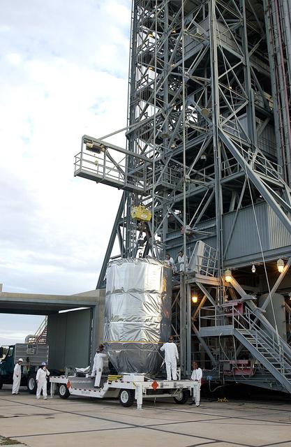 NASA image: KENNEDY SPACE CENTER, FLA. -  On Launch Pad 17-B, Cape Canaveral Air Force Station, the Mars Exploration Rover 1 (MER-B) is ready to be lifted up the tower for mating with the Delta rocket.  The second of twin rovers being sent to Mars, it is equipped with a robotic arm, a drilling tool, three spectrometers, and four pairs of cameras that allow it to have a human-like, 3D view of the terrain. Each rover could travel as far as 100 meters in one day to act as Mars scientists' eyes and hands, exploring an environment where humans can't yet go.  MER-B is scheduled to launch June 26 at one of two available times,  12:27:31 a.m. EDT or 1:08:45 a.m. EDT.
