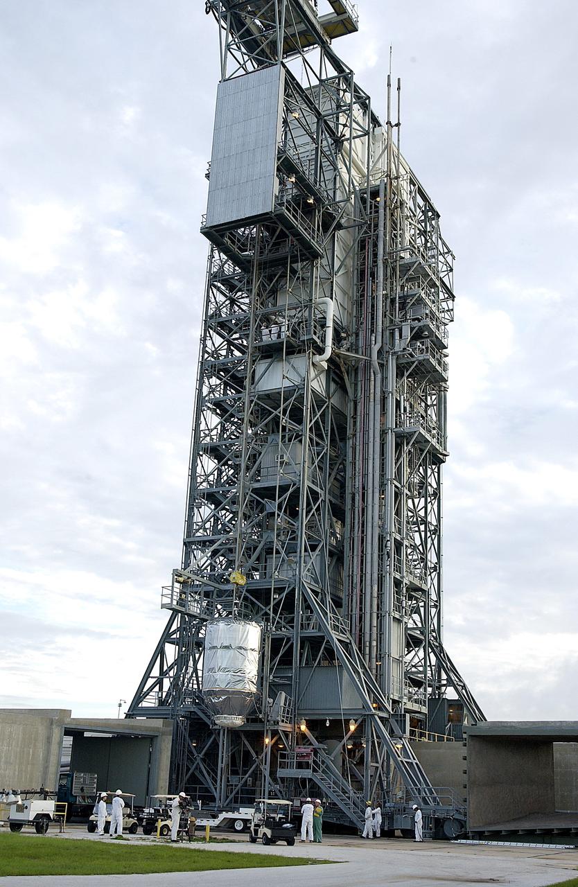 KENNEDY SPACE CENTER, FLA. -  On Launch Pad 17-B, Cape Canaveral Air Force Station, the Mars Exploration Rover 1 (MER-B) is lifted up the tower for mating with the Delta rocket.  The second of twin rovers being sent to Mars, it is equipped with a robotic arm, a drilling tool, three spectrometers, and four pairs of cameras that allow it to have a human-like, 3D view of the terrain. Each rover could travel as far as 100 meters in one day to act as Mars scientists' eyes and hands, exploring an environment where humans can't yet go.  MER-B is scheduled to launch June 26 at one of two available times,  12:27:31 a.m. EDT or 1:08:45 a.m. EDT.