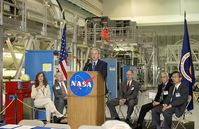 NASA image: KENNEDY SPACE CENTER, FLA. -   Alan Thirkettle, International Space Station Program manager for Node 2, European Space Agency (ESA), speaks to guests and the media gathered in the Space Station Processing Facility at a ceremony highlighting the arrival of two major components of the International Space Station.  NASA's Node 2, built by ESA in Italy, arrived at KSC on June 1. It will be the next pressurized module installed on the Station. The pressurized module of the Japanese Experiment Module (JEM), named "Kibo" (Hope), arrived at KSC on June 4. It is Japan's primary contribution to the Station. The ceremony held today included the official transfer of ownership signing of Node 2 between the ESA and NASA.. Emceed by Lisa Malone, deputy director of External Relations and Business Development at KSC, the ceremony also included these speakers: Center Director Roy Bridges Jr.; NASA’s Michael C. Kostelnik, deputy associate administrator for International Space Station and Shuttle Programs and William Gerstenmaier, International Space Station Program manager; Andrea Lorenzoni, International Space Station Program manager for Node 2, Italian Space Agency; and Kuniaki Shiraki, JEM Project manager, National Aerospace and Development Agency of Japan.