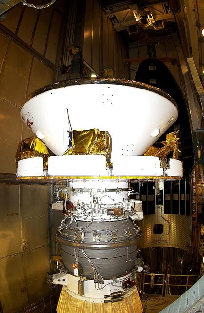 NASA image: KENNEDY SPACE CENTER, FLA. - At Launch Complex 17-B, Cape Canaveral Air Force Station, Mars Exploration Rover-1 (MER-B) is prepared for the installation of its spacecraft fairing. The second of twin rovers being sent to Mars, it is equipped with a robotic arm, a drilling tool, three spectrometers, and four pairs of cameras that allow it to have a human-like, 3D view of the terrain. Each rover could travel as far as 100 meters in one day to act as Mars scientists' eyes and hands, exploring an environment where humans are not yet able to go. MER-B is scheduled to launch no earlier than June 28 at one of two available times, 11:56:16 p.m. EDT or 12:37:59 a.m. EDT.