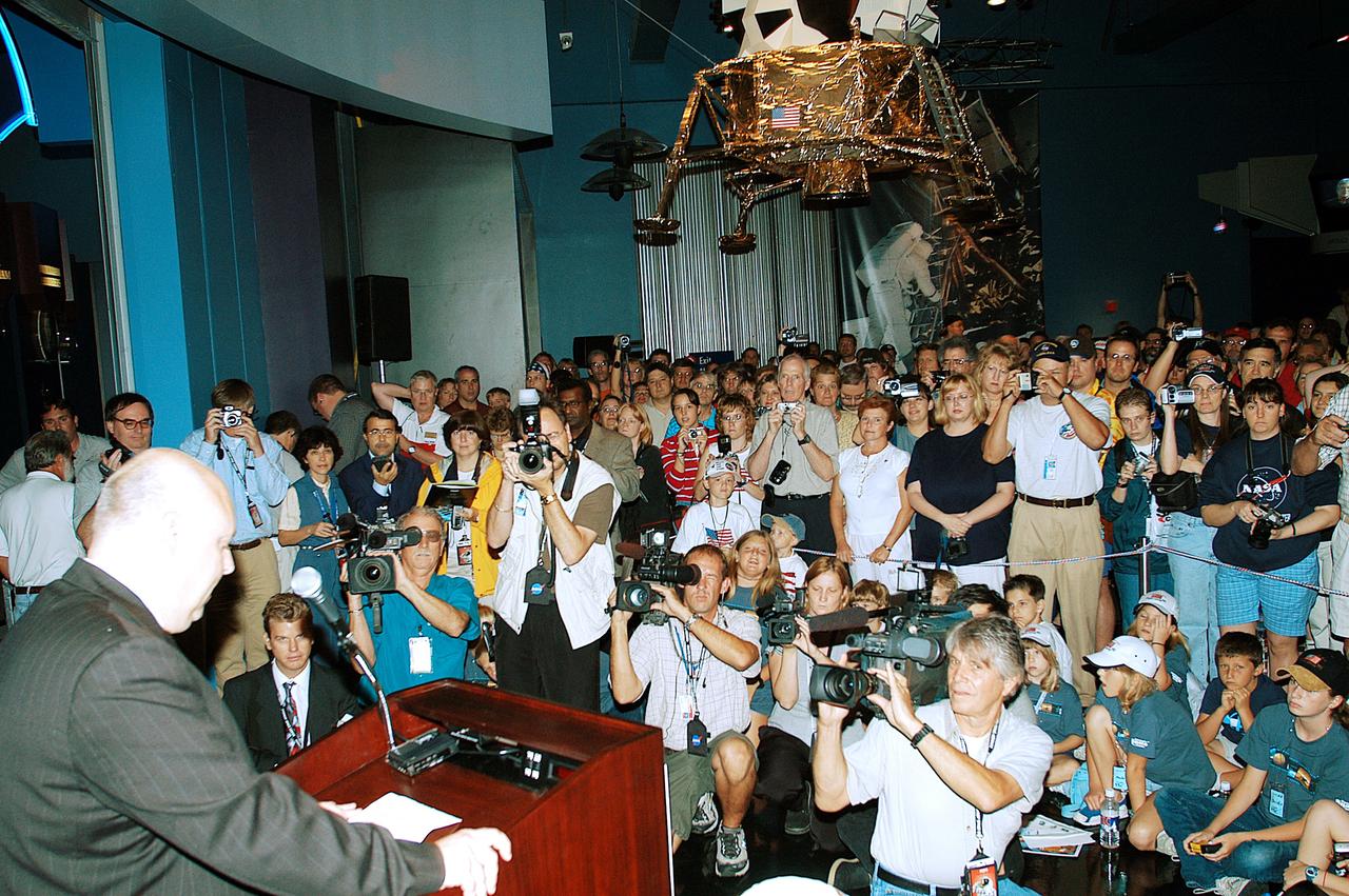 KENNEDY SPACE CENTER, FLA. -  Daniel LeBlanc, chief operating officer of Delaware North Companies Parks and Resorts at KSC, makes the opening remarks to hundreds of guests and media representatives attending a ribbon cutting ceremony officially opening the U.S. Astronaut Hall of Fame as part of the Kennedy Space Center Visitor Complex.  The ceremony was held in conjunction with the induction of four Space Shuttle astronauts into the Hall of Fame including Daniel Brandenstein, Robert "Hoot" Gibson, Story Musgrave, and Sally Ride.  Conceived by six of the Mercury Program astronauts, the U.S. Astronaut Hall of Fame opened in 1990 to provide a place where space travelers could be remembered for their participation and accomplishments in the U.S. space program.  The four new inductees join 48 previously honored astronauts from the ranks of the Gemini, Apollo, Skylab, Apollo-Soyuz, and Space Shuttle programs.