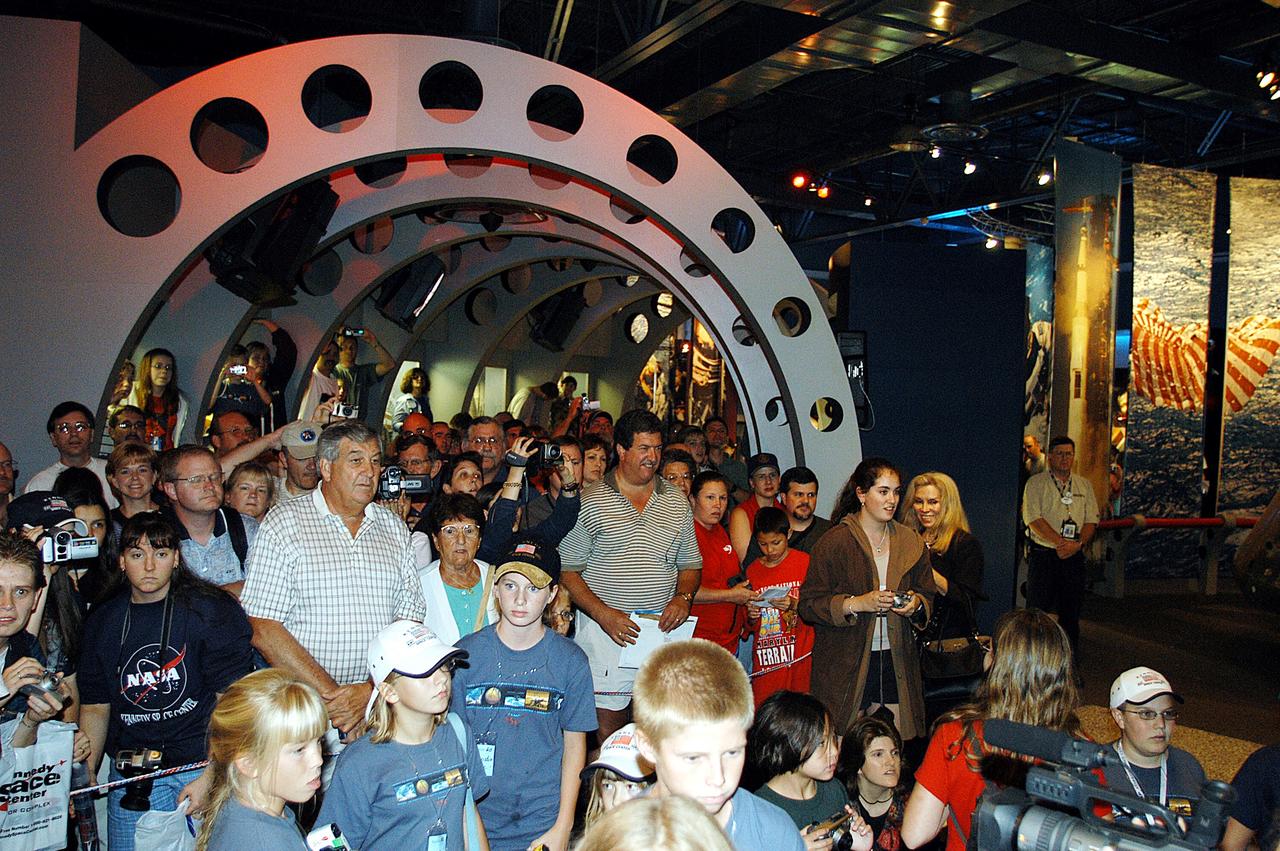 KENNEDY SPACE CENTER, FLA. -  Hundreds of guests attend a ribbon cutting ceremony officially opening the U.S. Astronaut Hall of Fame as part of the Kennedy Space Center Visitor Complex. The ceremony was held in conjunction with the induction of four Space Shuttle astronauts into the Hall of Fame including Daniel Brandenstein, Robert "Hoot" Gibson, Story Musgrave, and Sally Ride. Conceived by six of the Mercury Program astronauts, the U.S. Astronaut Hall of Fame opened in 1990 to provide a place where space travelers could be remembered for their participation and accomplishments in the U.S. space program. The four new inductees join 48 previously honored astronauts from the ranks of the Gemini, Apollo, Skylab, Apollo-Soyuz, and Space Shuttle programs.