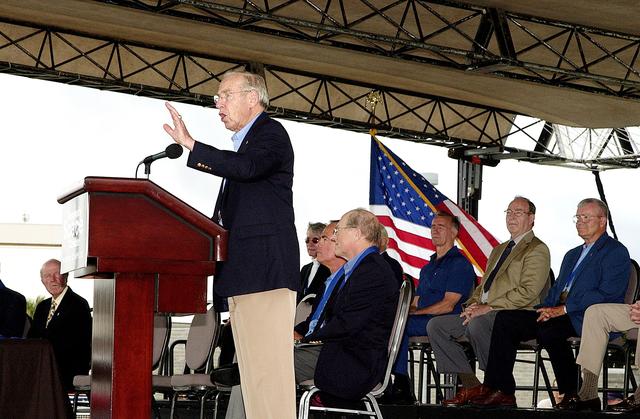 NASA image: KENNEDY SPACE CENTER, FLA. -  At the KSC Visitor Complex, former astronaut James Lovell makes the opening remarks at the induction ceremony of four Space Shuttle astronauts into the U.S. Astronaut Hall of Fame. Being inducted are Daniel Brandenstein, Robert "Hoot" Gibson, Story Musgrave, and Sally Ride. Conceived by six of the Mercury Program astronauts, the U.S. Astronaut Hall of Fame opened in 1990 to provide a place where space travelers could be remembered for their participation and accomplishments in the U.S. space program. The four new inductees join 48 previously honored astronauts from the ranks of the Gemini, Apollo, Skylab, Apollo-Soyuz, and Space Shuttle programs.